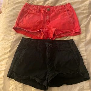 American Eagle shorts size 2. Black pair and pink/red pair